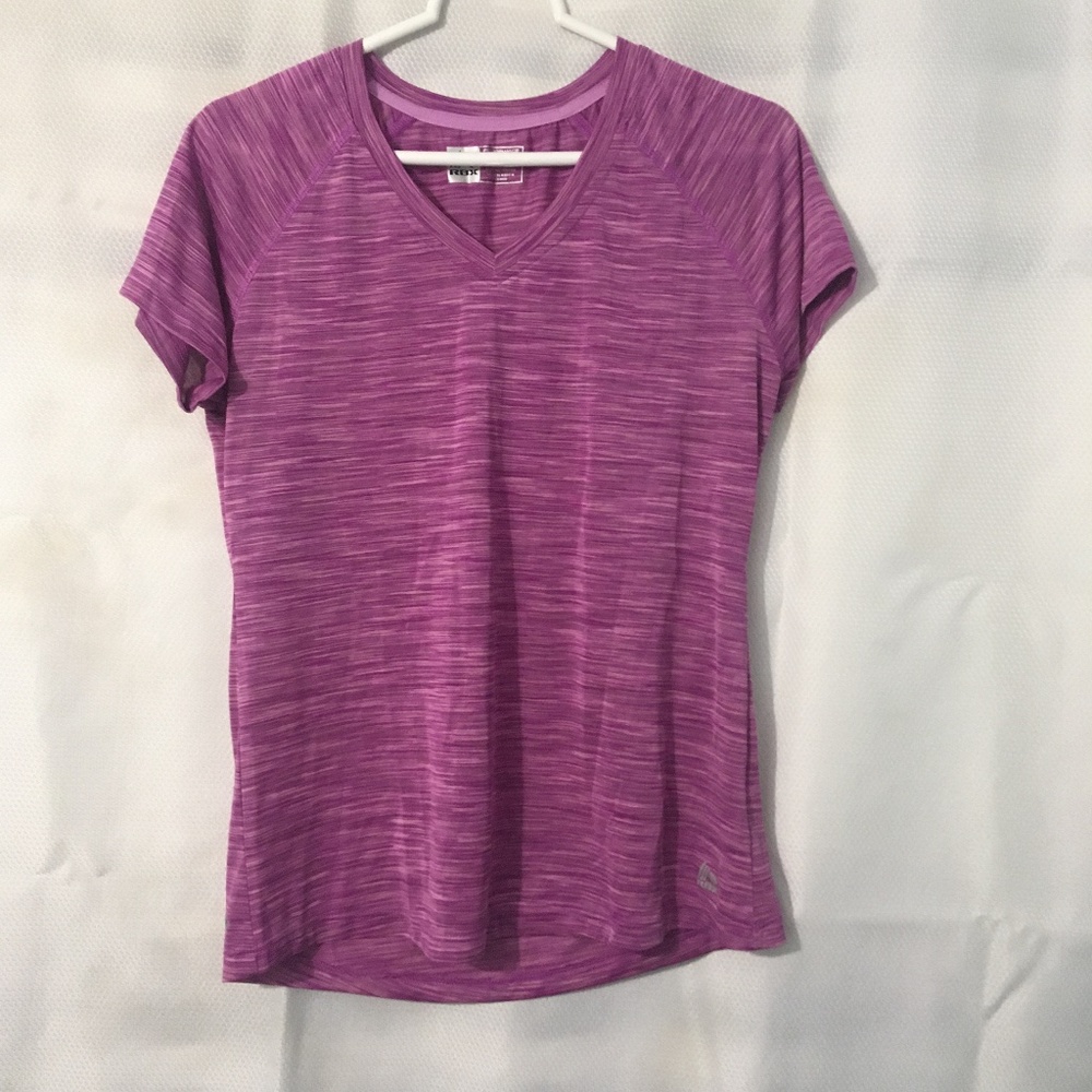 Woman’s Size Large Performance Rebook RBX Pink/Purple shirt New w/out tags